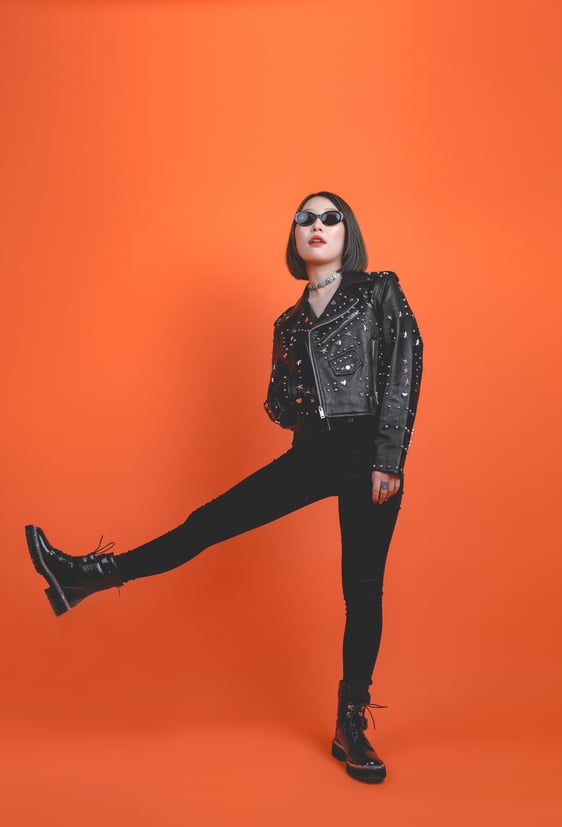 Woman in Black Leather Jacket and Black Pants